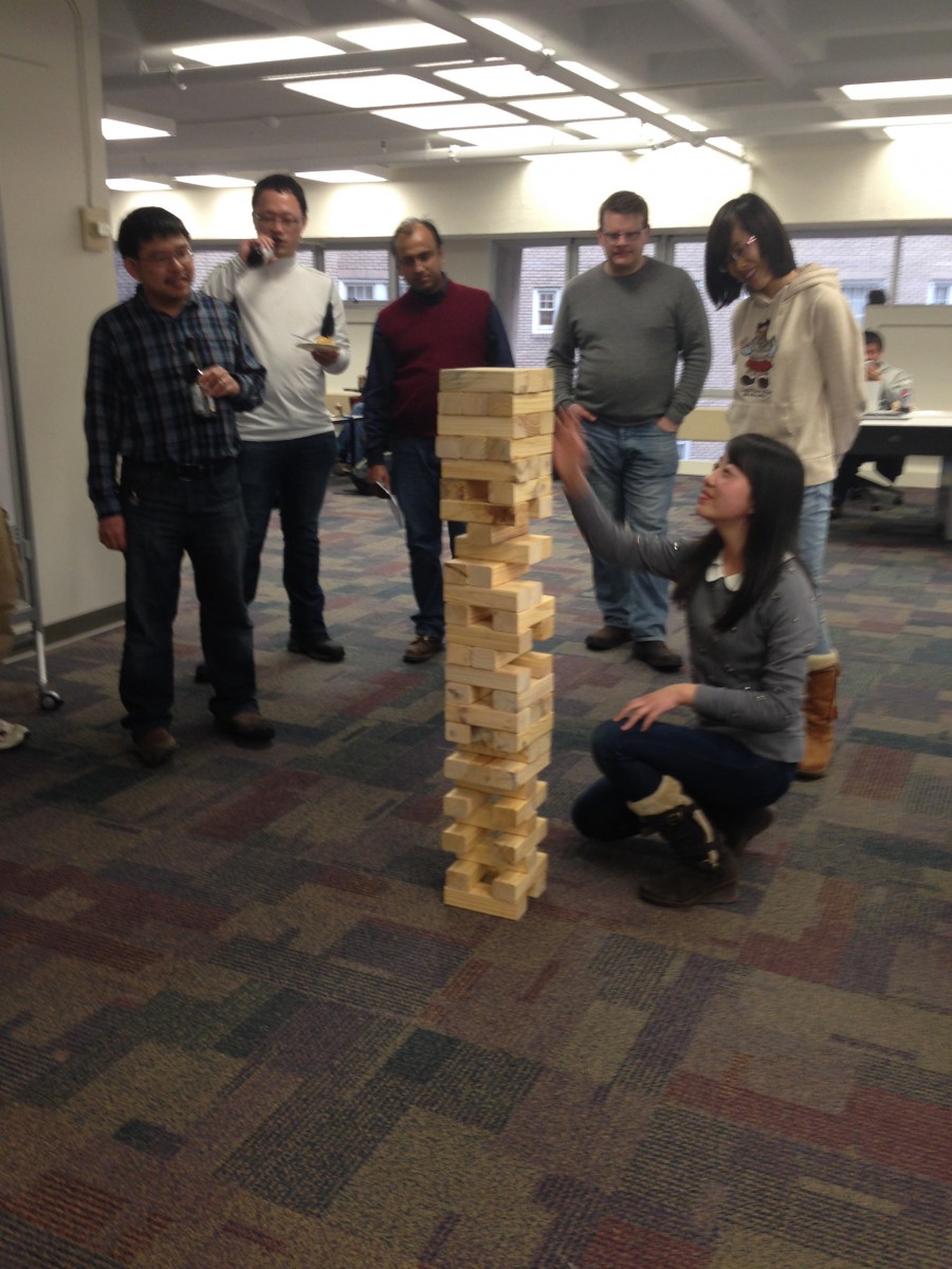 Giant Jenga contender looking for the right block to remove